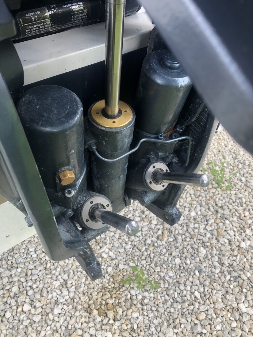 Clean serviced trim and tilt cylinders