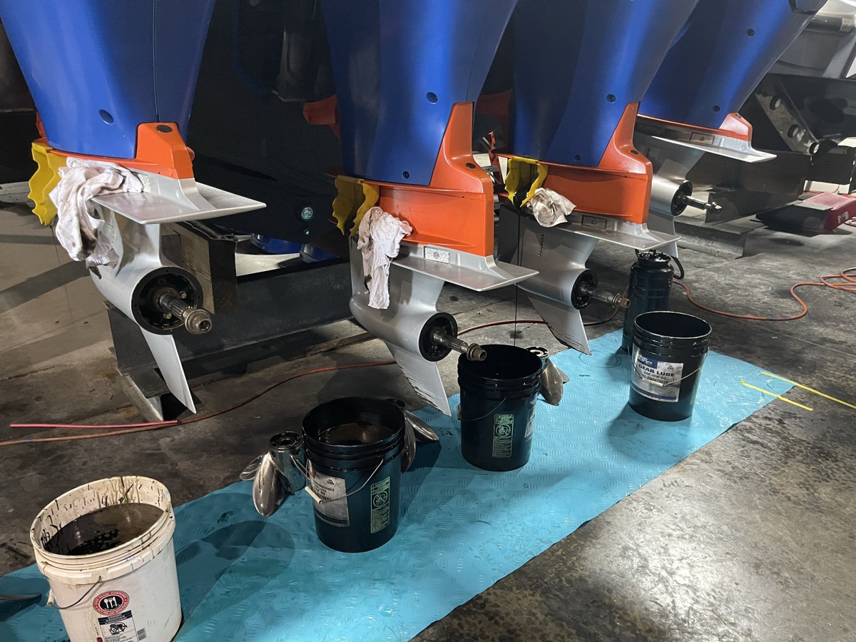 Gearcase oil service with props off on triple Mercury Racing outboards