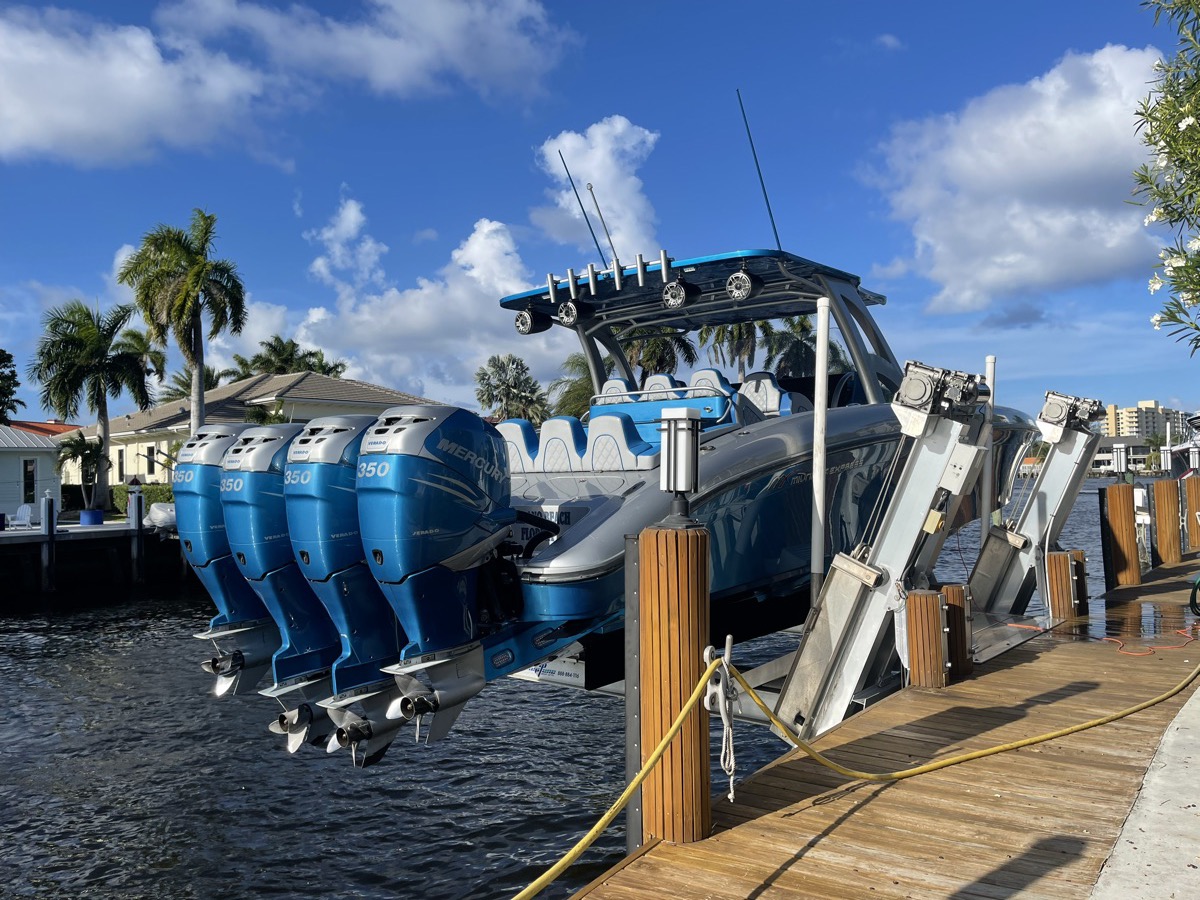 Quad Mercury Verado 350 outboards on a boat lift for service