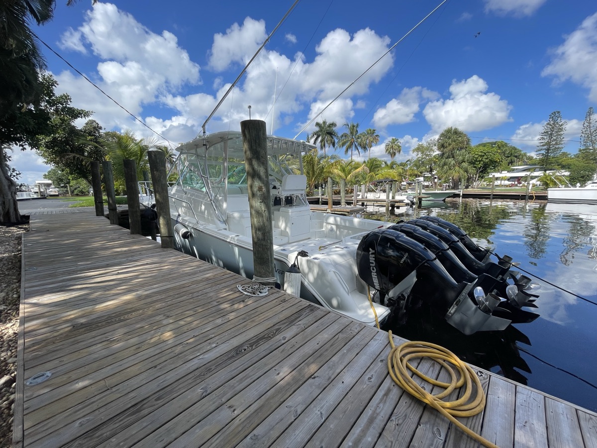 Sportfish with quad Mercury Verado outboards serviced at the dock